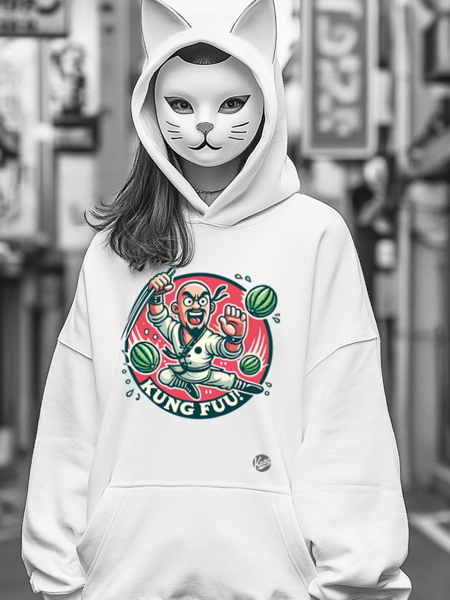 Person in white hoodie showcasing a colorful T-shirt design featuring a cartoon character in a kung fu pose, surrounded by watermelon slices, wearing a unique cat mask.