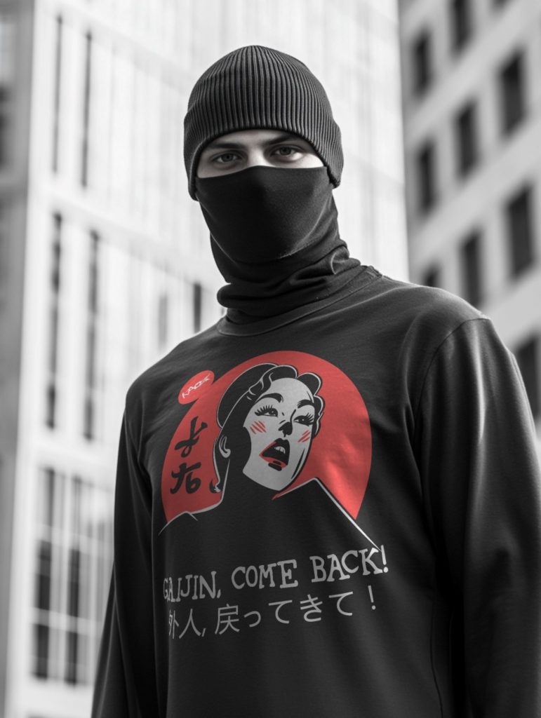 Person wearing a black beanie and face mask, showcasing a long-sleeve shirt with a graphic design of a woman against a red background, text reading 'GAIJIN, COME BACK!' in Japanese characters.