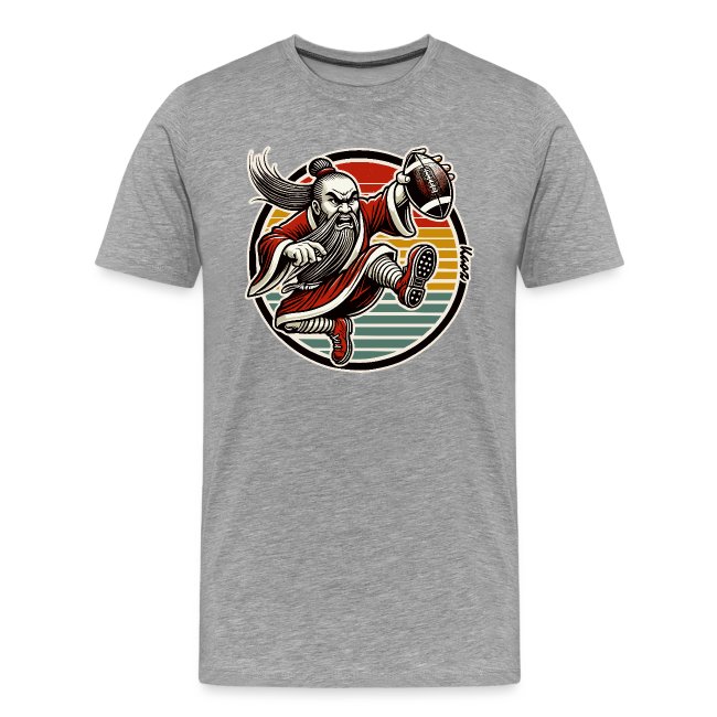 Gray graphic t-shirt with vibrant illustration of a bearded character in red outfit kicking a football, framed by colorful retro stripes
