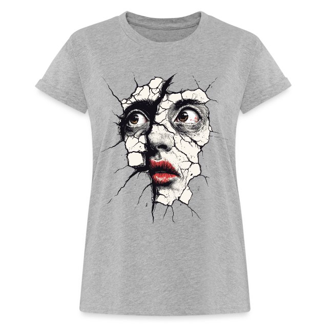 Gray t-shirt featuring a dramatic graphic design of a woman's face emerging from a cracked wall, showcasing detailed facial features, expressive eyes, and bright red lips.