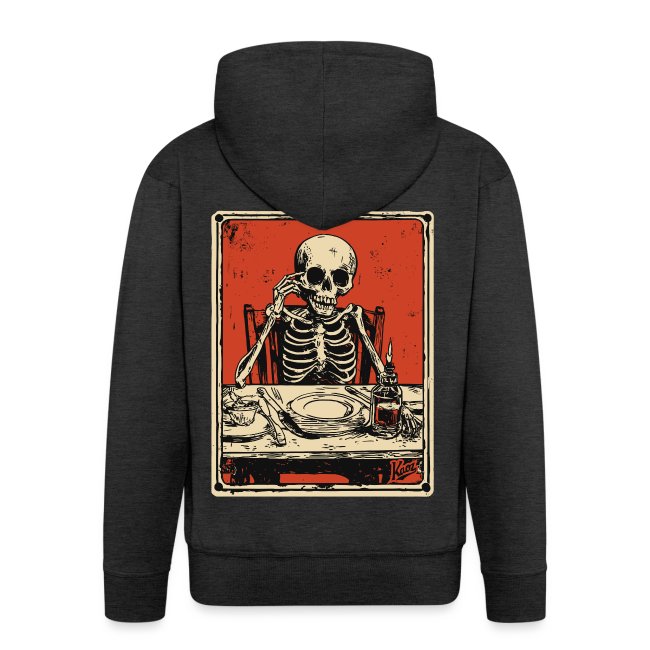 Black hooded sweatshirt featuring a vibrant graphic of a humorous skeleton seated at a table with empty plates and a drink, set against a bold orange background.
