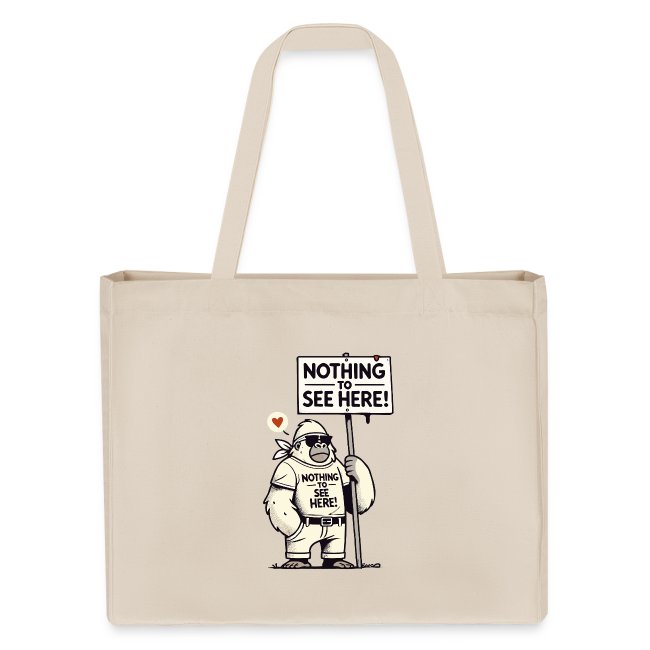 A beige tote bag featuring a cartoon gorilla in disguise holding a sign that reads "Nothing to See Here!" – a humorous and ironic design.