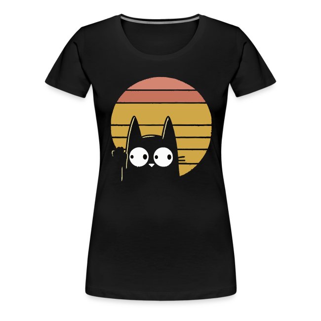 Black t-shirt featuring a cartoon cat with large eyes peeking from behind a stylized sun in warm orange and yellow tones, delivering a retro aesthetic