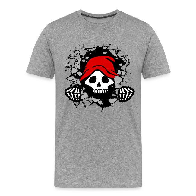 Gray t-shirt with a striking design of a skull wearing a red bandana emerging from a cracked wall, showcasing black and white detailing.