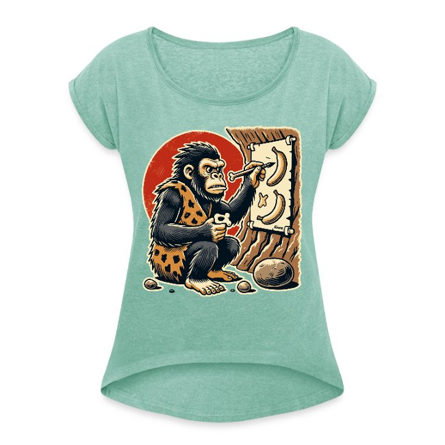 Light green t-shirt featuring a cartoonish caveman sitting cross-legged, holding a bone tool, with a humorous design and a large red circle background.