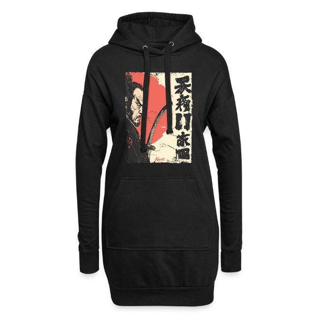 A long-sleeve black shirt featuring a playful vintage-style graphic design of a cartoon red droplet character with expressive eyes and a wide smile, surrounded by green splashes.